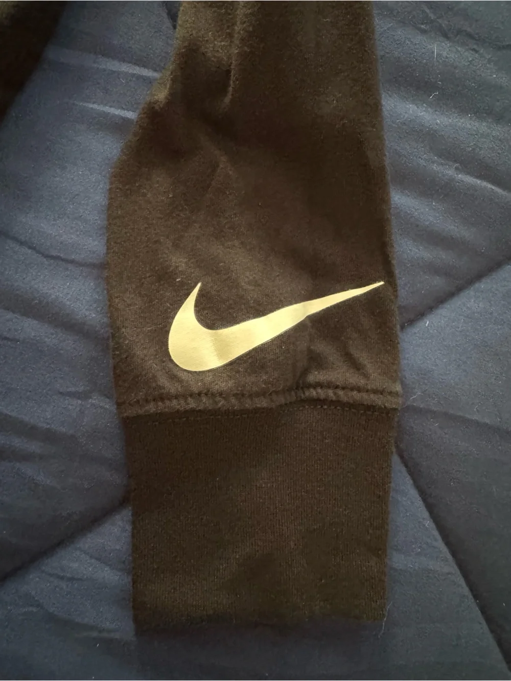 Nike Youth Black Long Sleeve Shirt with Gold Lettering